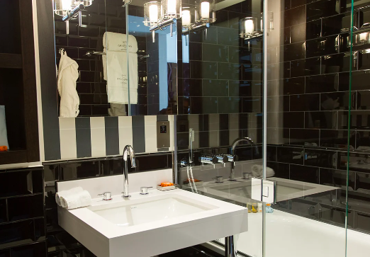 Bathrooms within the rooms are brilliantly decored in black and white.