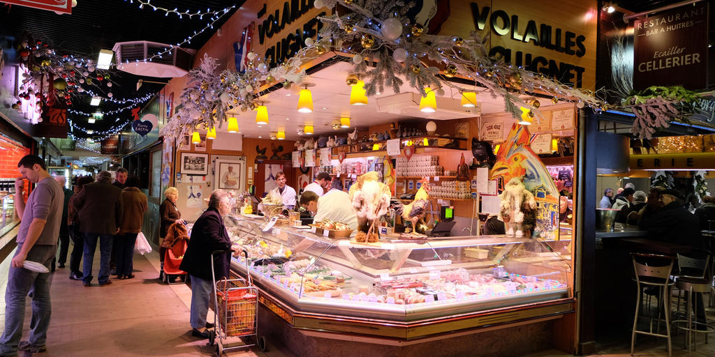 A food stall at the French food market Halles De Lyon - Paul Bocuse,