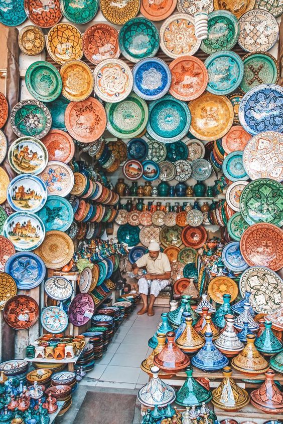 Tajine or Tagine earthenware and bowls at a souk in Morocco.