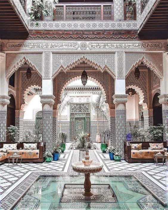 a beautiful Moroccan riad with a water feature in Fes.
