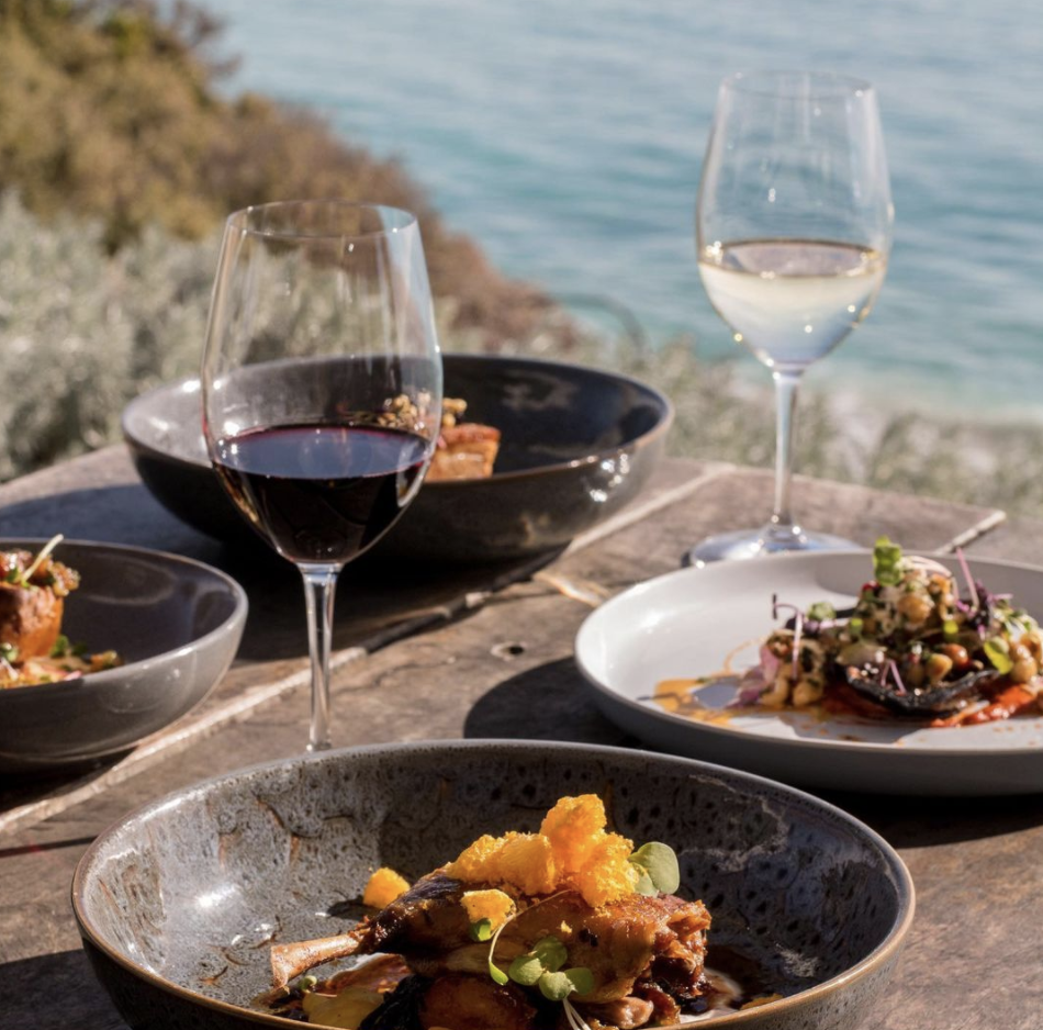 glasses of wine and food near the seaside at Star of Greece in Adelaide