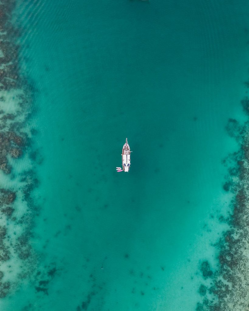 boat in ocean at a distance