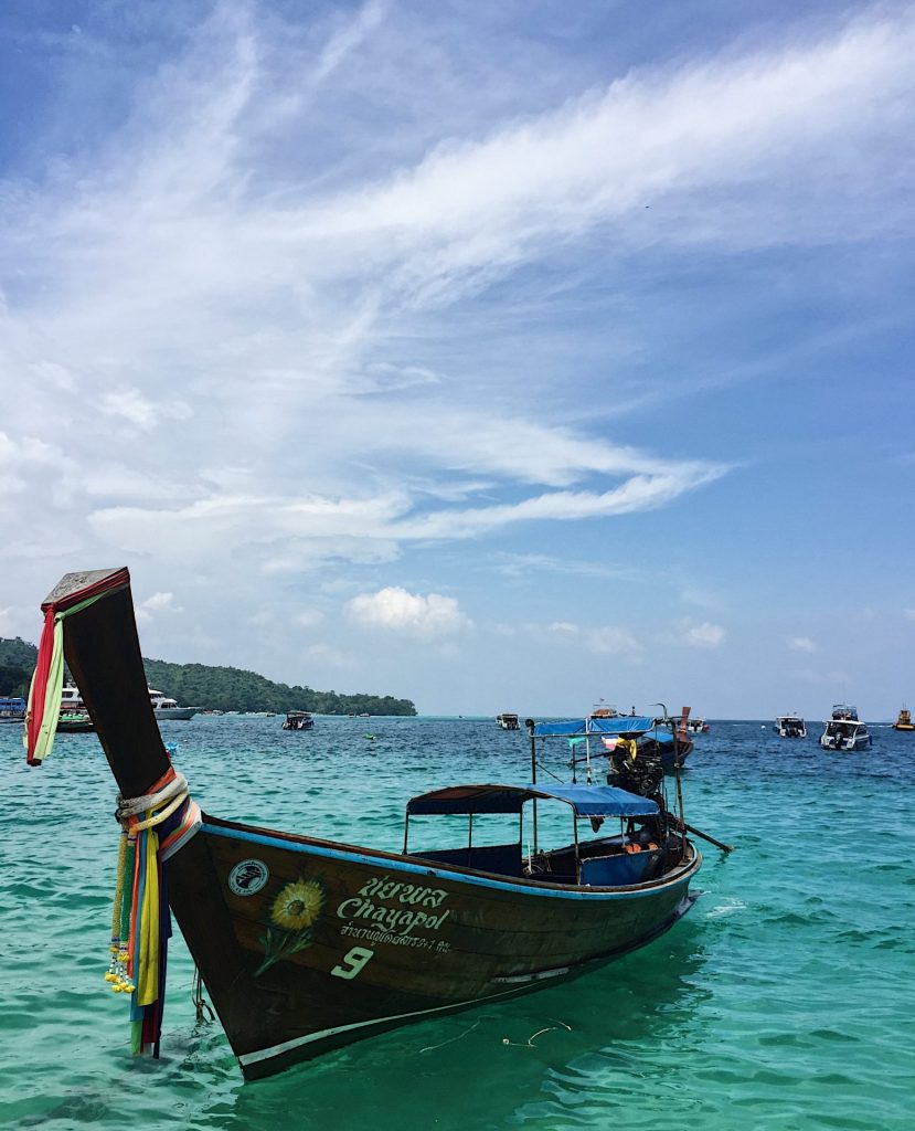 asian style boat on the water in Thailand