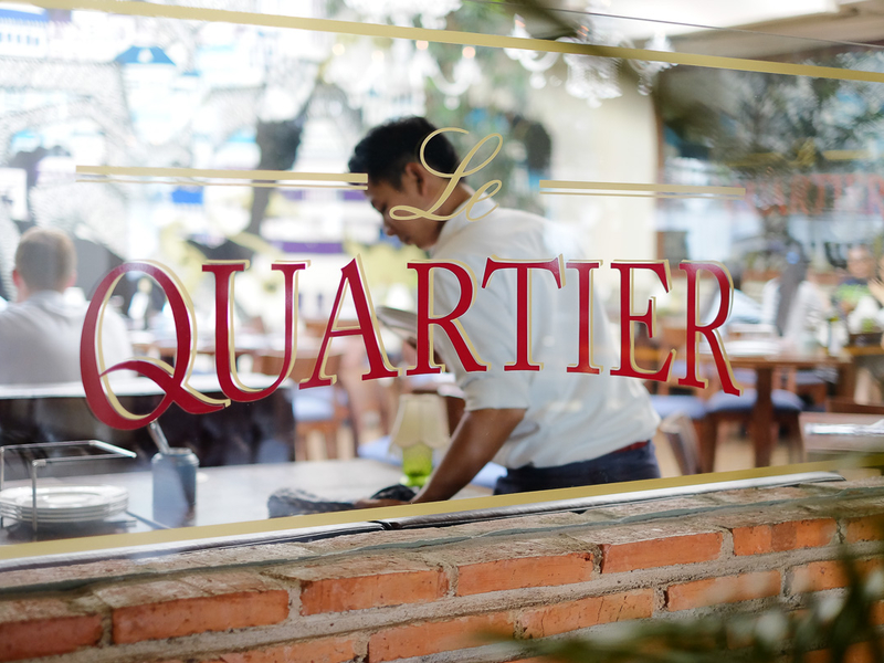 looking through window of French restayrant le quarter in jakarta