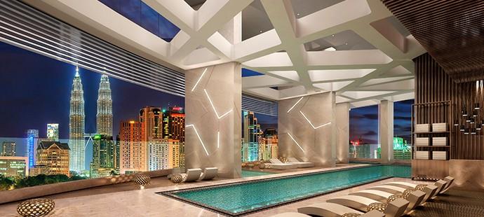 Image of swimming pool at Banyan Tree with view of city's skyline.