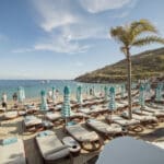 Blue and white umbrellas on the beach